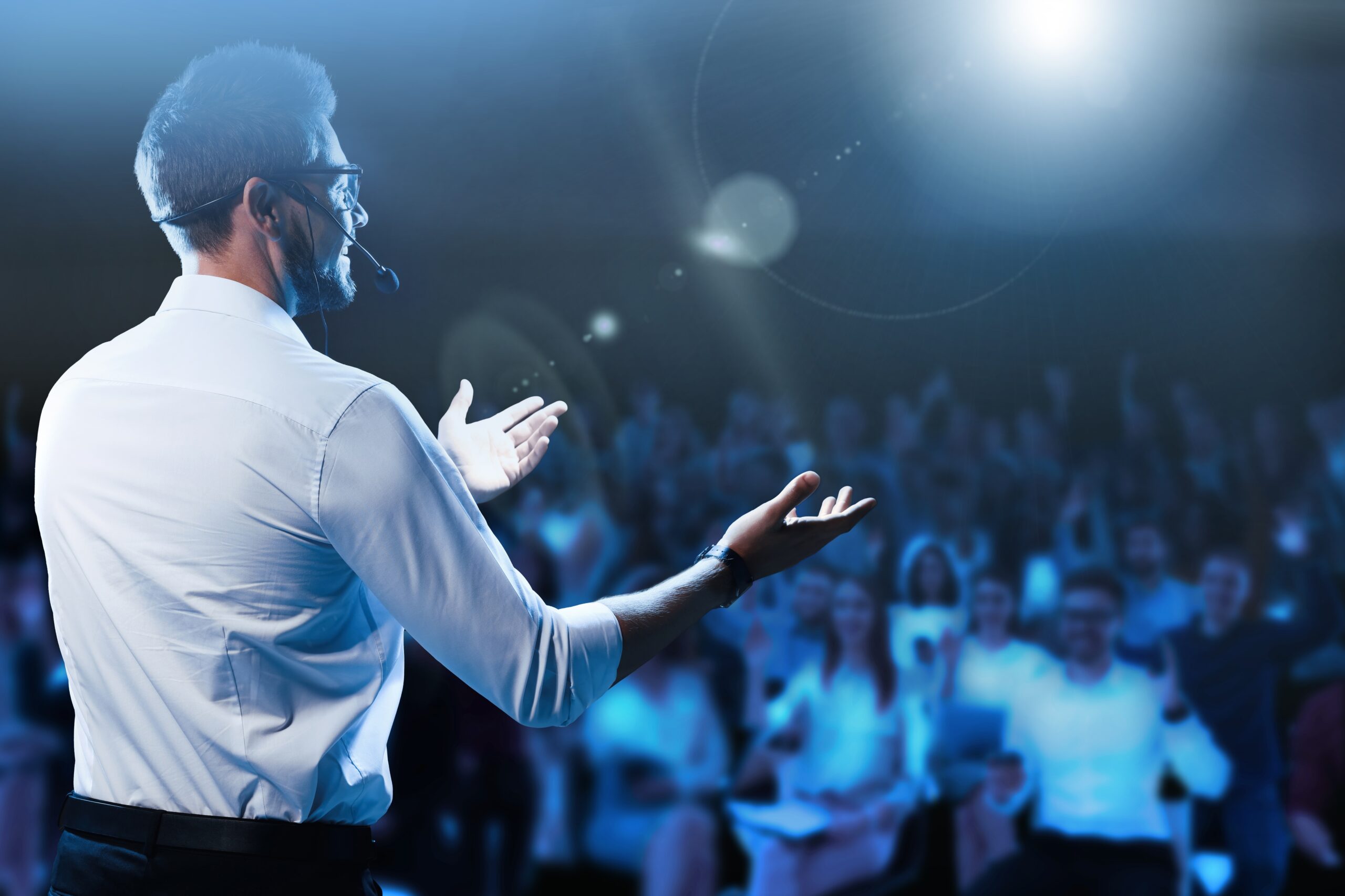 Motivational,Speaker,With,Headset,Performing,On,Stage